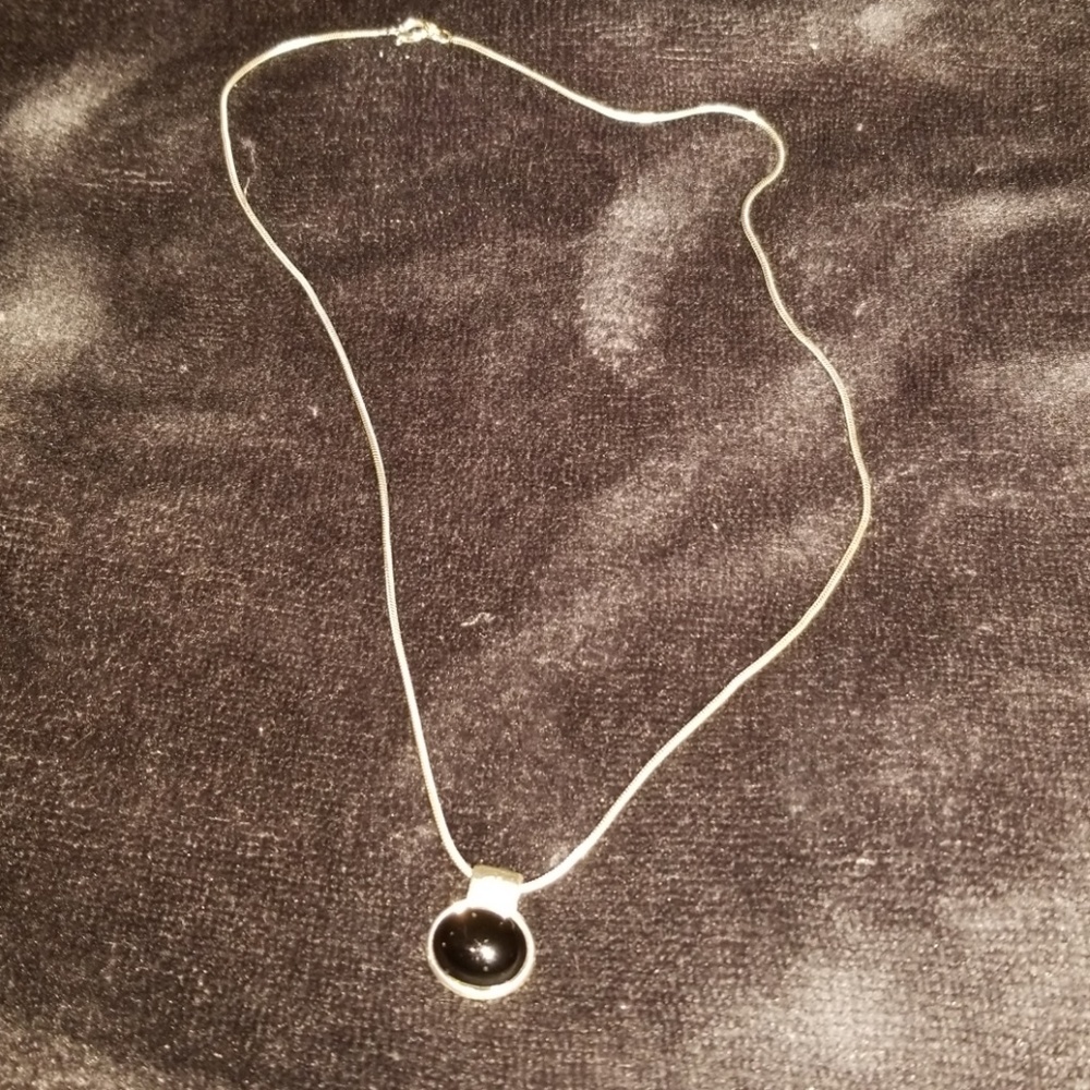 Silver necklace with black stone pendant